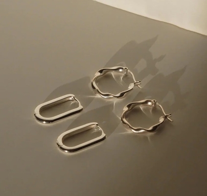 Orecchini di moda personalizzati spessi 18 in oro rivestito onde di acciaio inox